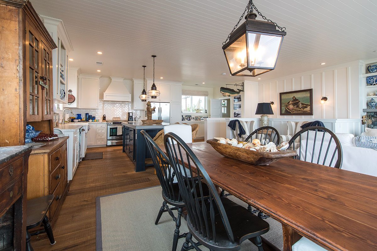 Beach cottage kitchen with navy island